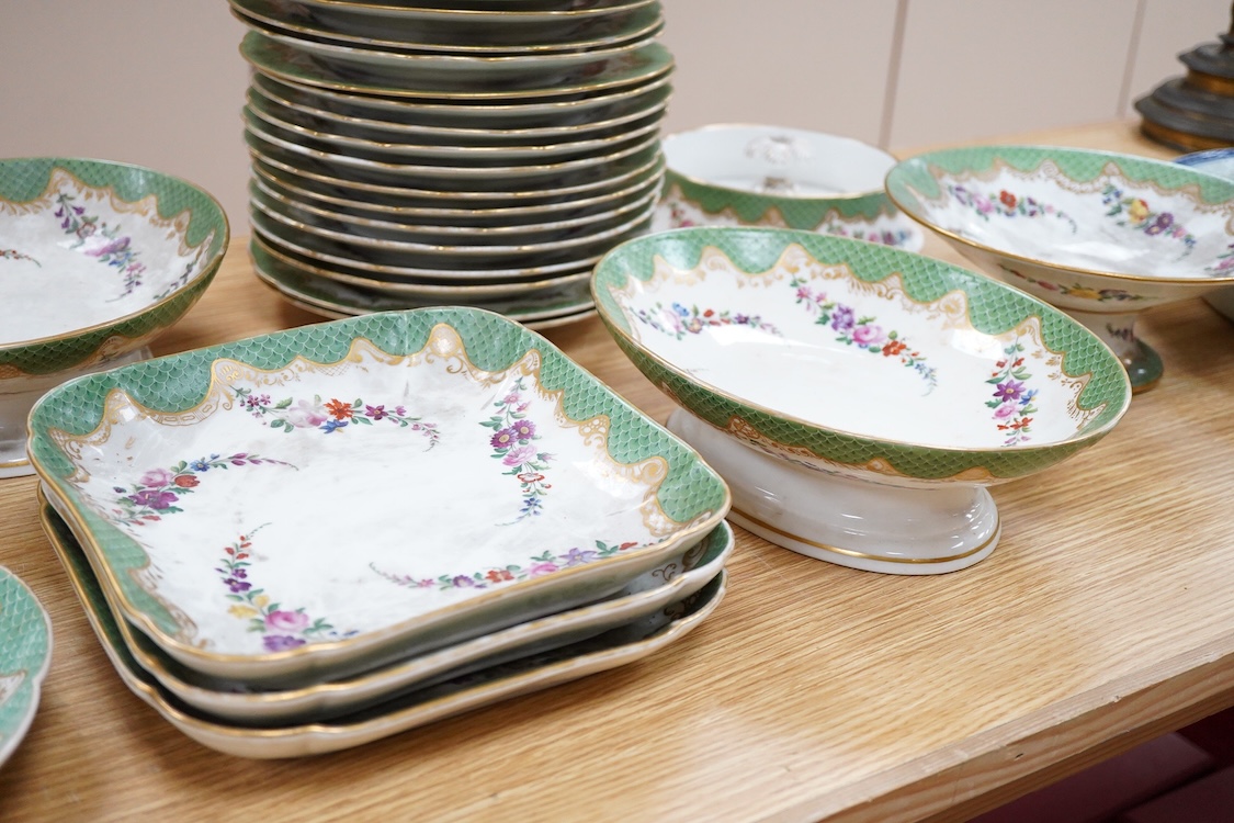 A 19th century French Paris porcelain part dessert service with green scale borders by Nast Paris, largest 26cm wide